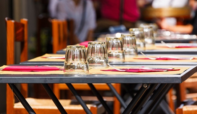 Restaurant table with glasses and silverware