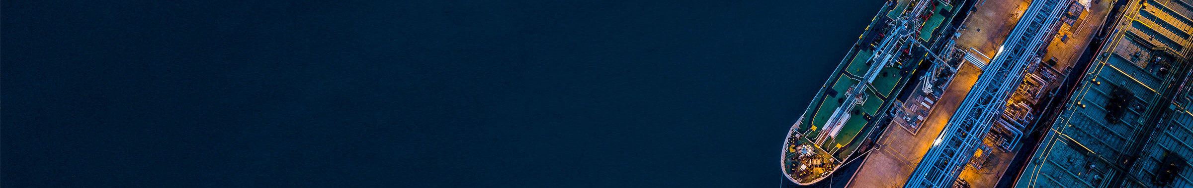 Aerial top view over international containers cargo ship at industrial import-export port